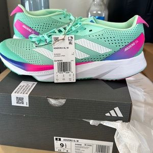 BRAND NEW! Womens adidas adizero SL speed shoe/gym shoe.